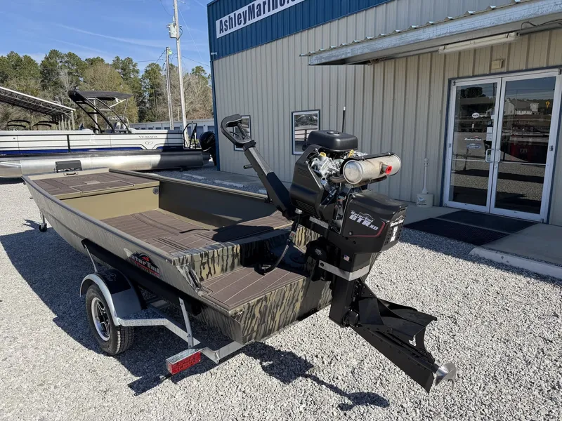 Slide: The Image of Gator Tail Extreme Series 1754 boat outside Ashley Marine building. - 7