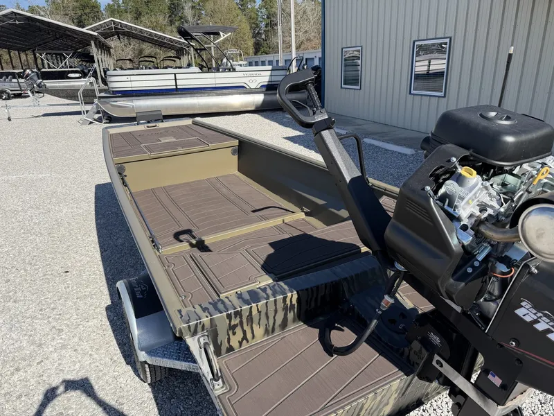 Slide: The Image of Gator Tail Extreme Series 1754 boat, 2026 model, on a trailer. - 8