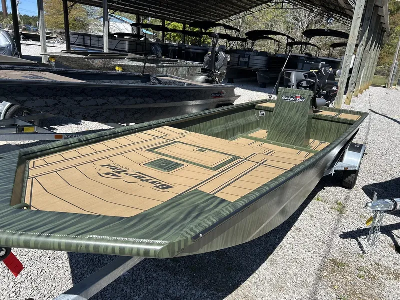 Slide: The Image of Gator Tail Extreme Series 20x60 CC boat, 2026 model, on a trailer. - 6