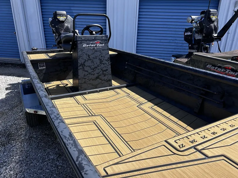 Slide: The Image of Gator Tail Extreme Series 20x60 CC boat, 2026 model, featuring sleek design. - 5