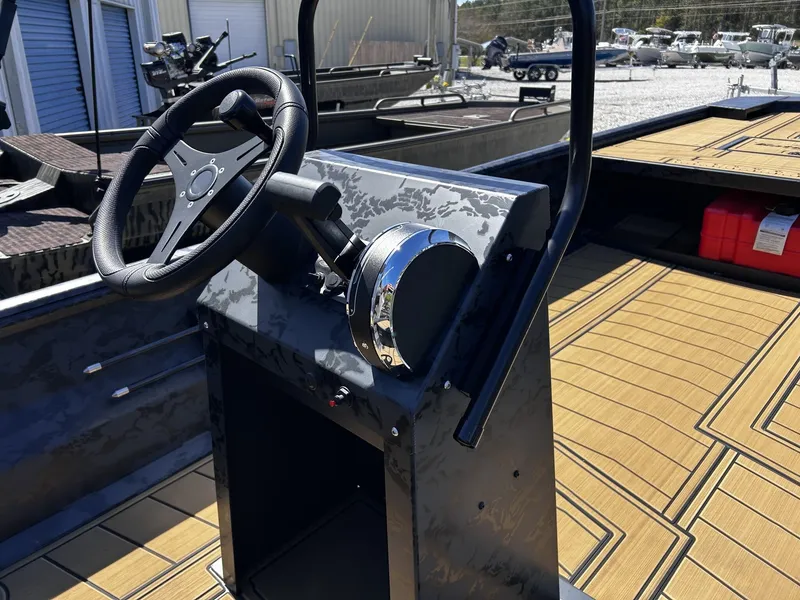 Slide: The Image of Steering wheel of Gator Tail Extreme Series 20x60 CC boat, 2026 model. - 7
