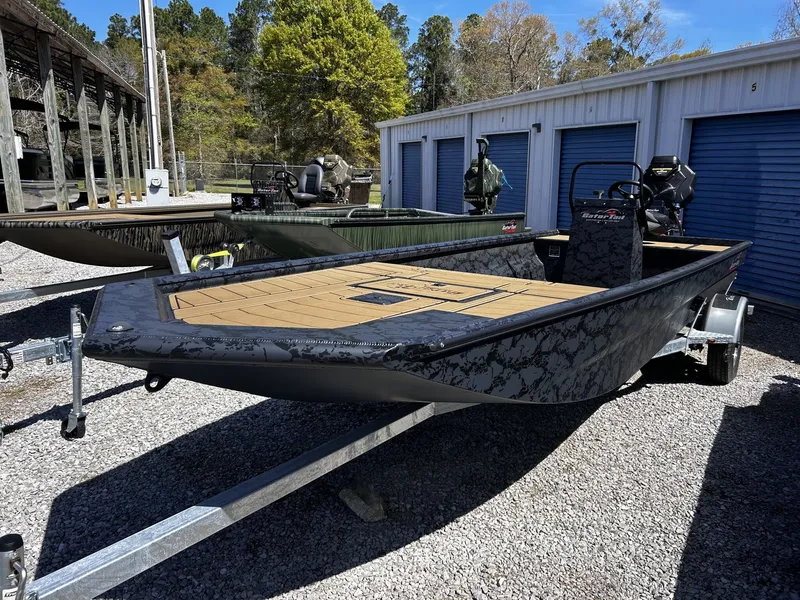 Slide: The Image of 2026 Gator Tail Extreme Series 20x60 CC boat on trailer. - 8