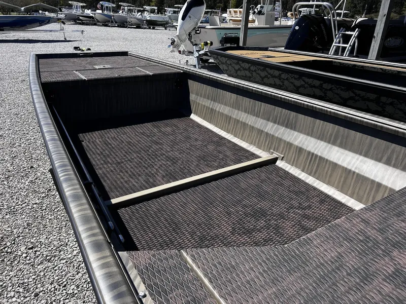 Slide: The Image of Gator Tail Extreme Series 1754 boat, 2026 model, on gravel lot. - 7