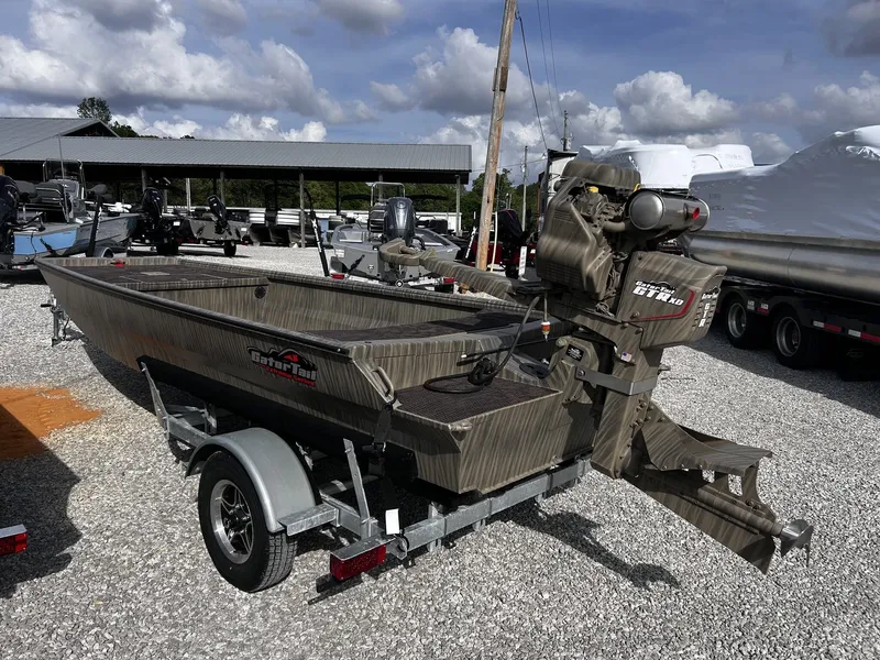 Slide: The Image of Gator Tail Extreme Series 1754 boat, 2026 model, on trailer outdoors. - 9
