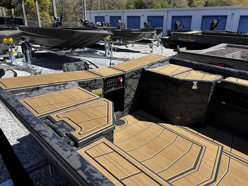 Slide: The Image of Gator Tail Extreme Series 1854 boat, 2026 model, on a trailer. - 6