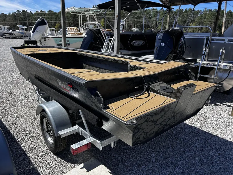 Slide: The Image of Gator Tail Extreme Series 1854 boat, 2026 model, on a trailer. - 7