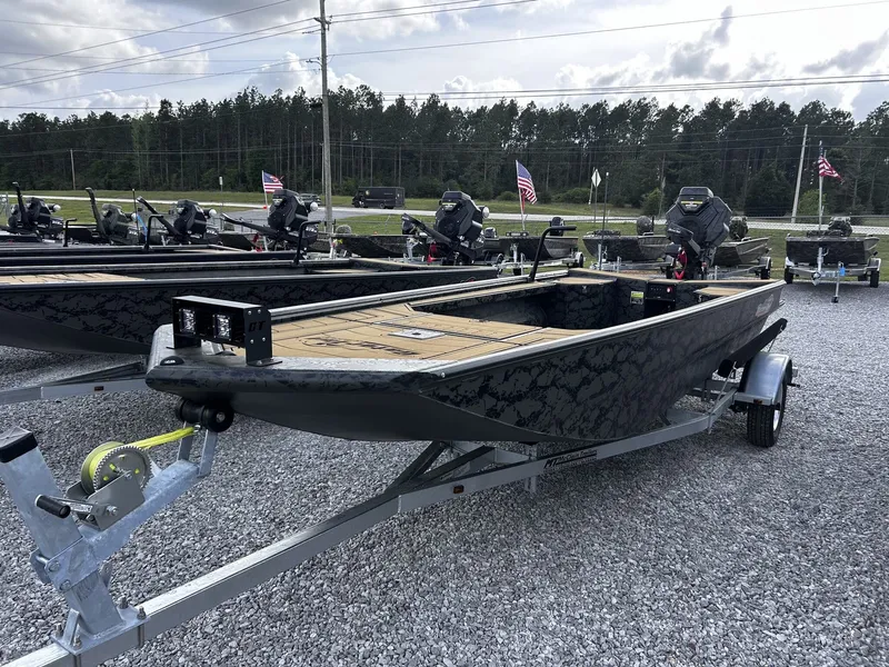 Slide: The Image of 2026 Gator Tail Extreme Series 1854 boat on trailer, displayed outdoors. - 8