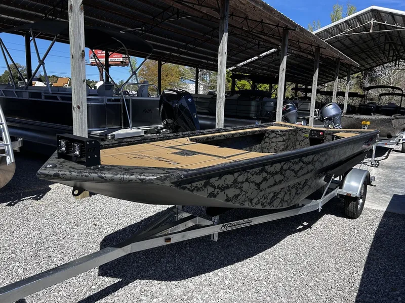 Slide: The Image of 2026 Gator Tail Extreme Series 1854 boat on trailer outdoors. - 9