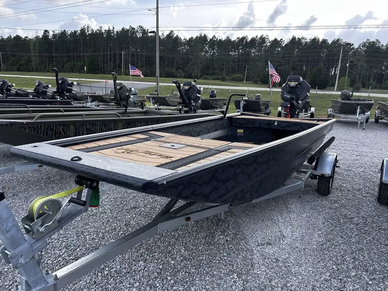 The Image of 2026 Gator Tail Extreme Series 1754 boat on trailer outdoors. - 1
