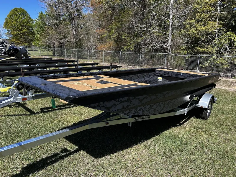 Slide: The Image of 2026 Gator Tail Extreme Series 1754 boat on trailer outdoors. - 6