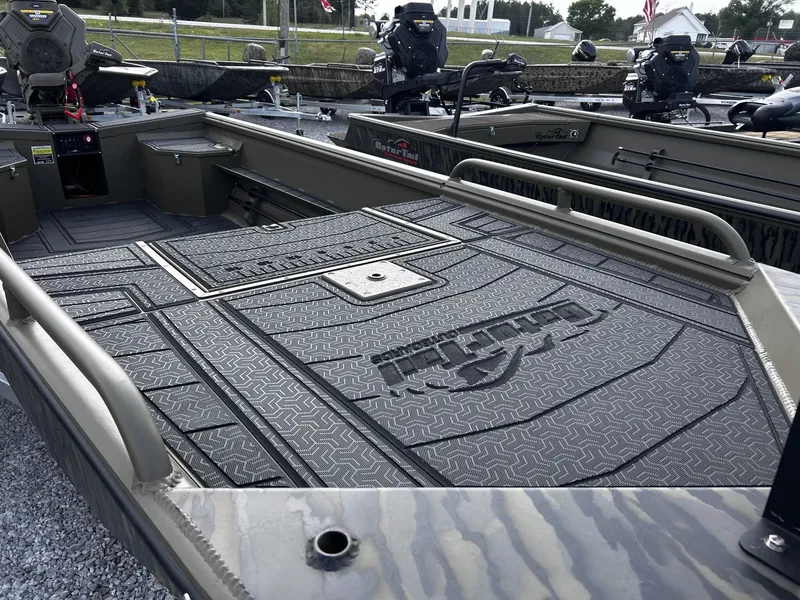 Slide: The Image of Gator Tail Savage Series 1750 boat, 2026 model, parked on gravel. - 7