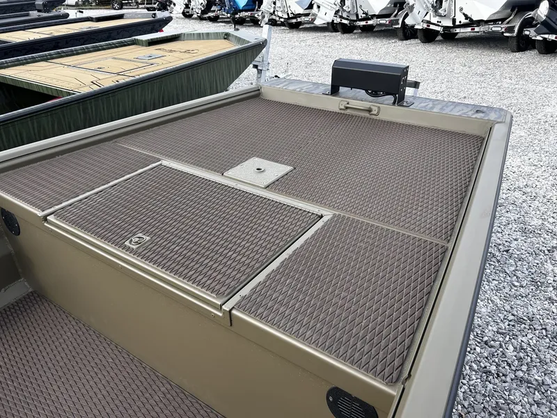 Slide: The Image of Gator Tail Extreme Series 17 x 54 boat, 2026 model, on gravel lot. - 6