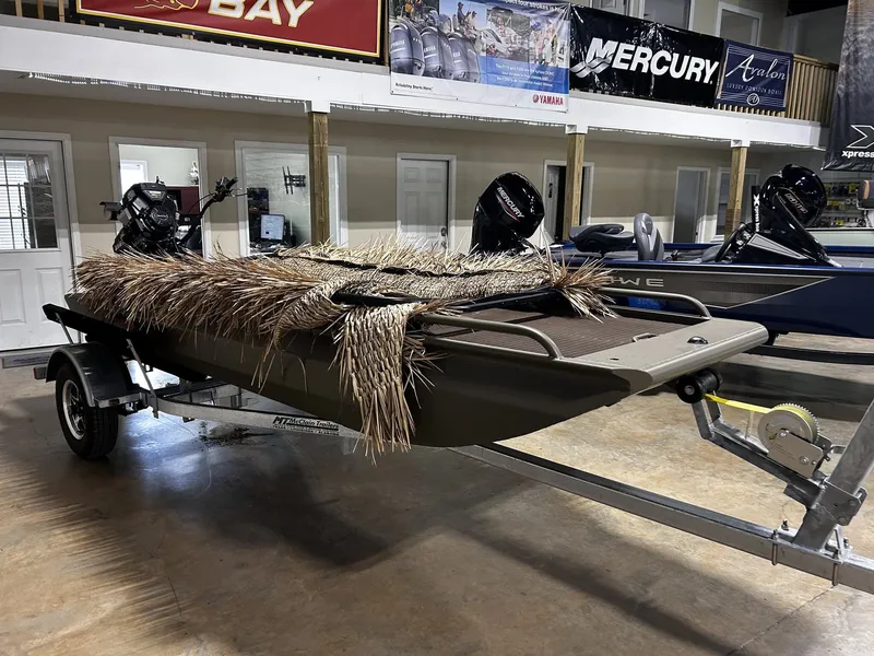 The Image of Gator Tail Gator Series 1448 Predator boat with 23HP, 2026 model, on trailer. - 1
