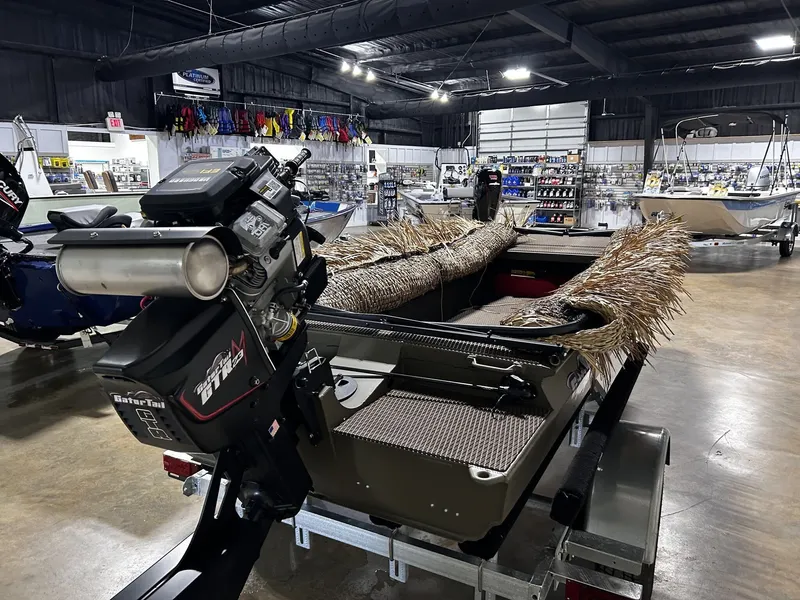 Slide: The Image of Gator Tail Gator Series 1448 Predator boat in showroom, 2026 model. - 3