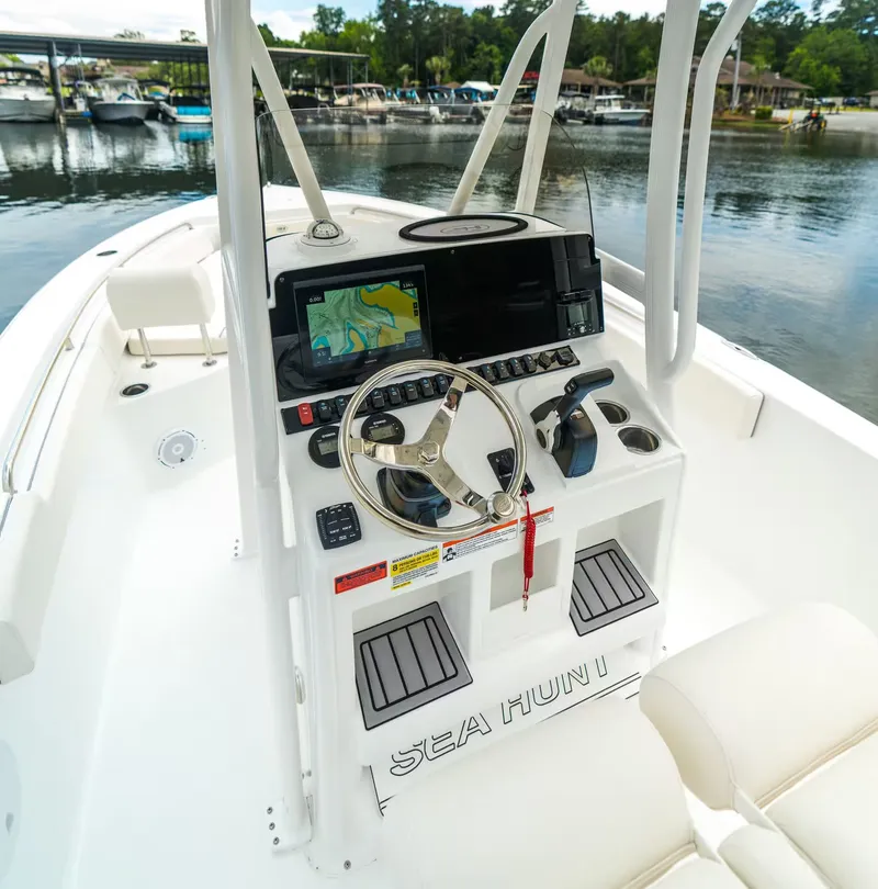 Slide: The Image of Sea Hunt Ultra 229 boat console, model year 2026. - 16