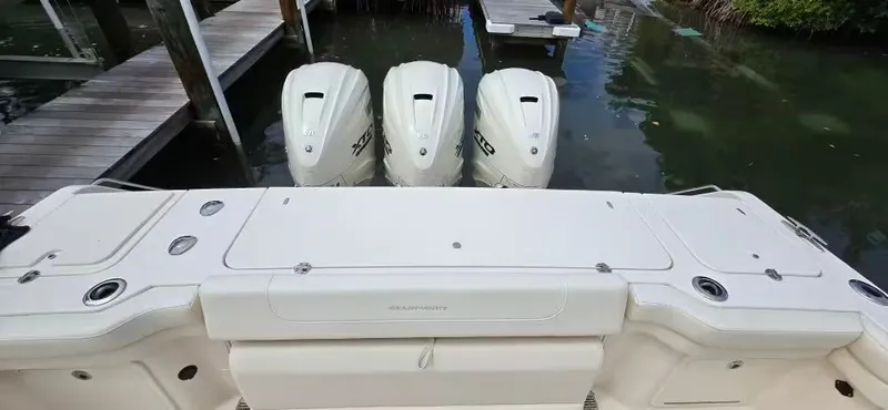 Slide: The Image of Grady-White Canyon 386 boat with three outboard engines, year 2024. - 11