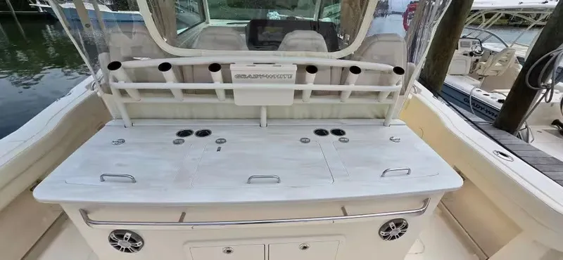 Slide: The Image of 2024 Grady-White Canyon 386 with rod holders and storage. - 17