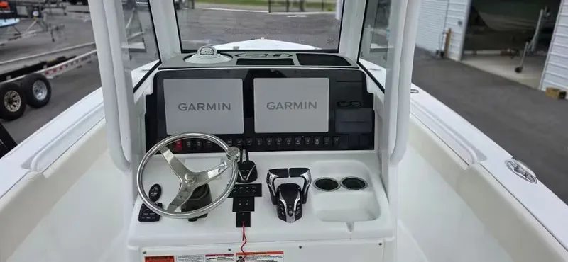 Slide: The Image of Sea Hunt 265 Ultra 2025 helm with Garmin displays. - 10