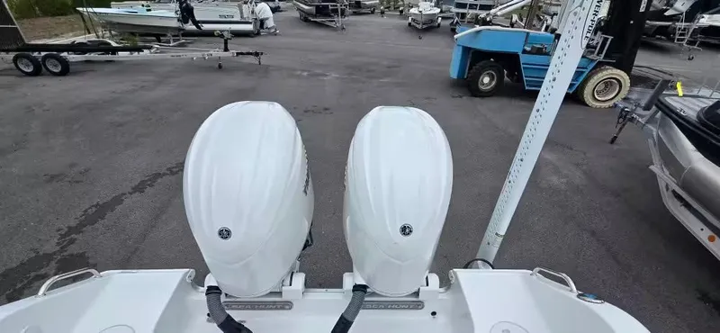 Slide: The Image of Two outboard motors on a 2025 Sea Hunt 265 Ultra boat. - 5