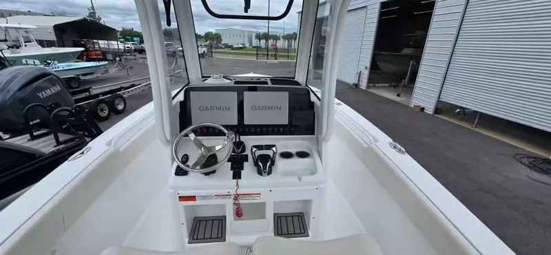 Slide: The Image of Interior view of 2025 Sea Hunt 265 Ultra with Garmin displays. - 9