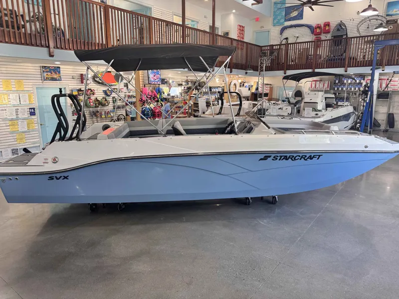 The Image of 2026 Starcraft SVX OB boat in showroom. - 1