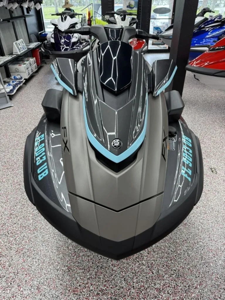 Slide: The Image of 2025 Yamaha WaveRunners FX® HO with Audio in a showroom. - 2