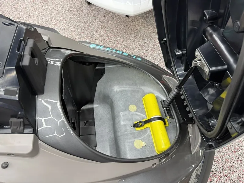 Slide: The Image of Yamaha WaveRunners 2025 FX® HO storage compartment with yellow accessory. - 4