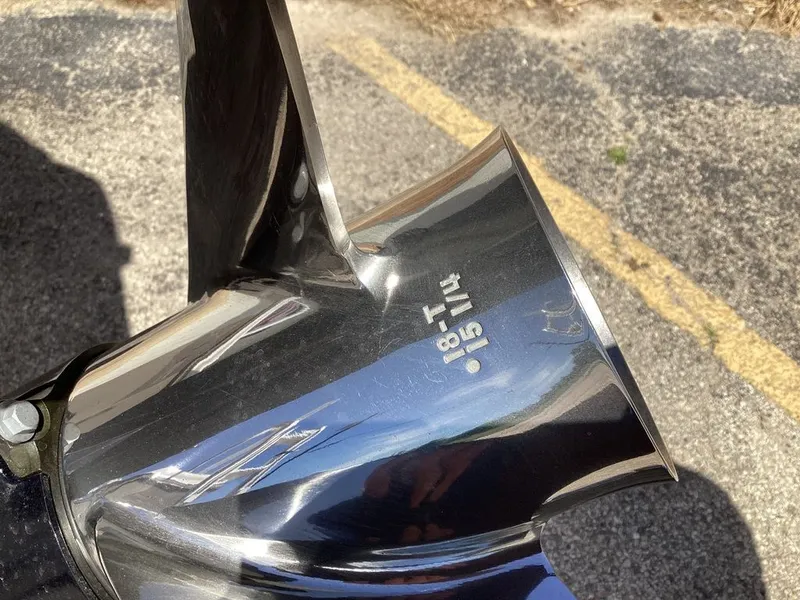 Slide: The Image of Close-up of a shiny boat propeller with engraving. - 10