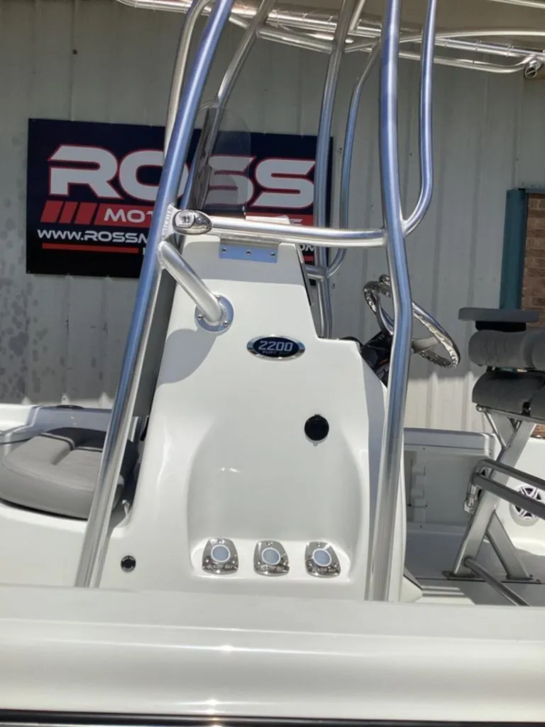 Slide: The Image of 2026 Blazer PureBay 2200 boat console with controls. - 15