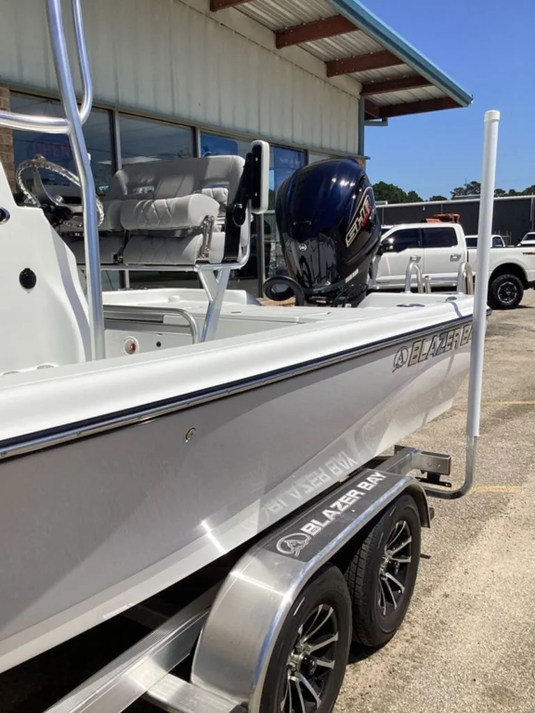 Slide: The Image of 2026 Blazer PureBay 2200 boat on trailer, side view. - 16