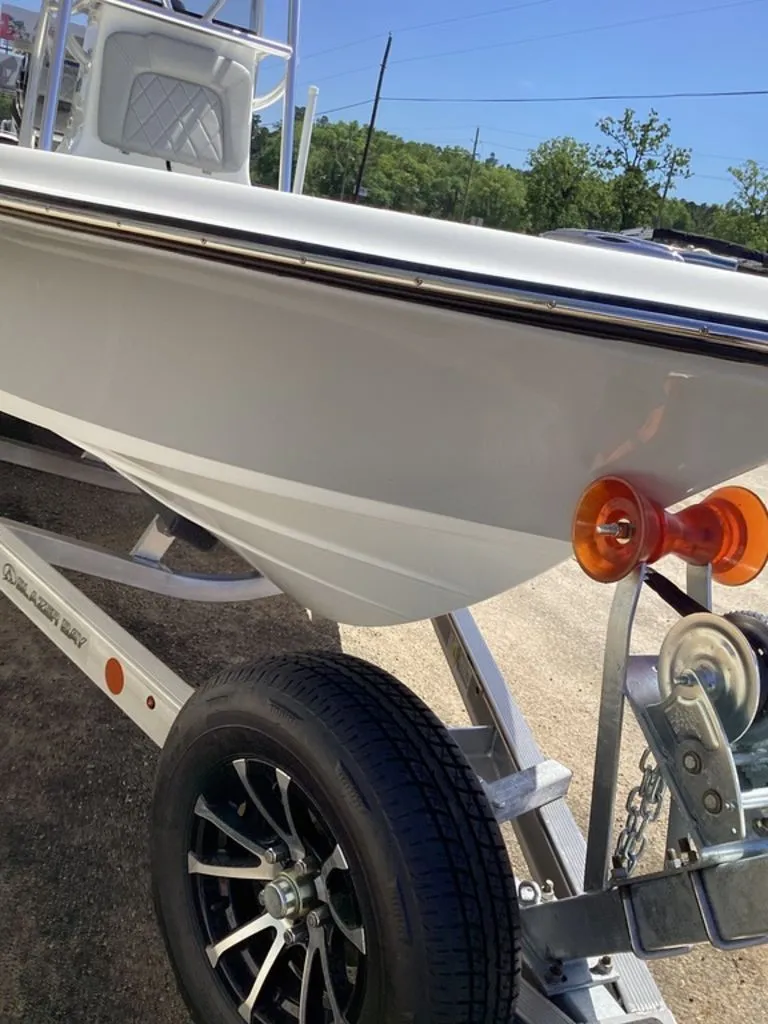 Slide: The Image of Blazer PureBay 2200 boat on trailer, 2026 model, side view. - 19