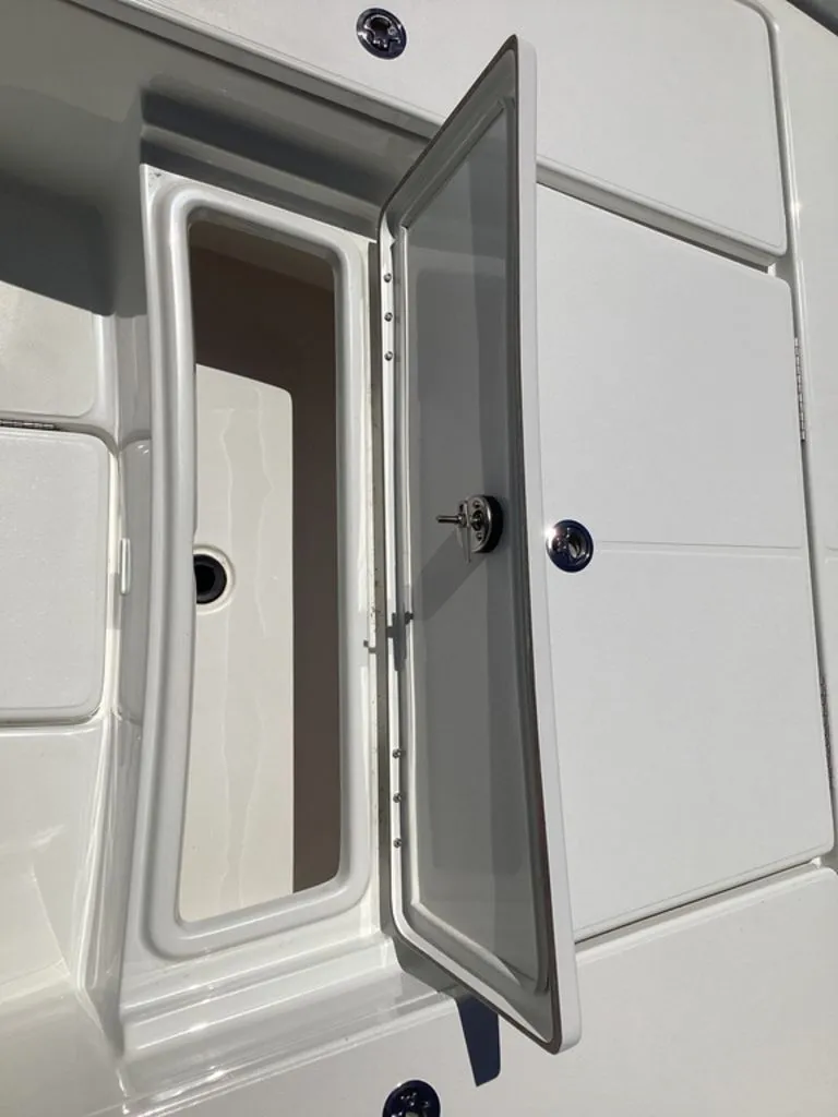 Slide: The Image of Open storage compartment on a 2026 Blazer PureBay 2200 boat. - 41