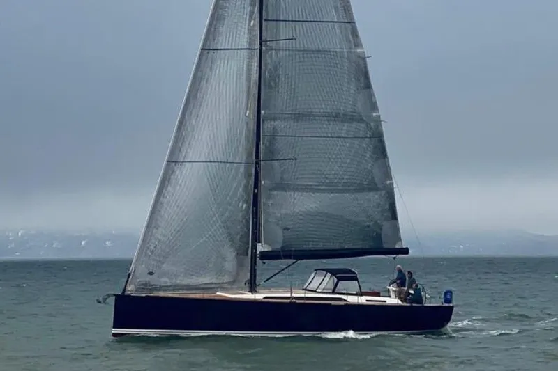 The Image of Sailing yacht Solaris 50, 2017 model, gliding on open water under cloudy skies. - 0
