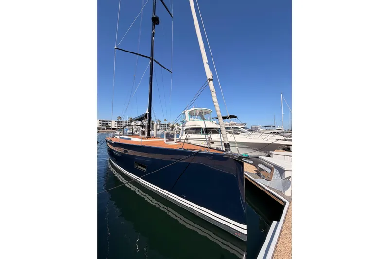 Slide: The Image of 2017 Solaris 50 yacht docked in marina under clear blue sky. - 10