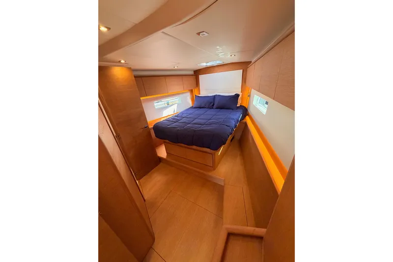 Slide: The Image of Luxurious interior cabin of a 2017 Solaris 50 yacht with a cozy bed. - 101