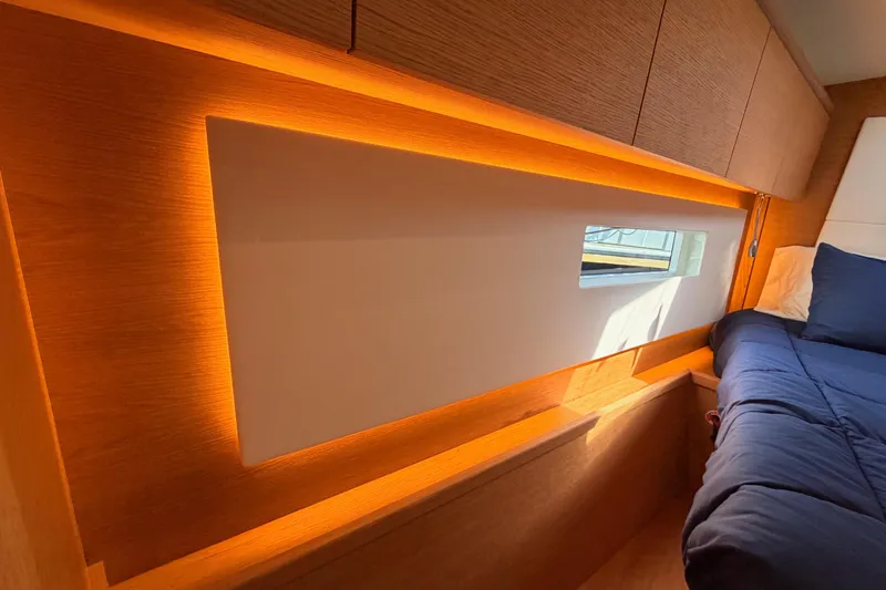 Slide: The Image of Luxurious interior of 2017 Solaris 50 yacht with modern wood paneling and ambient lighting. - 103