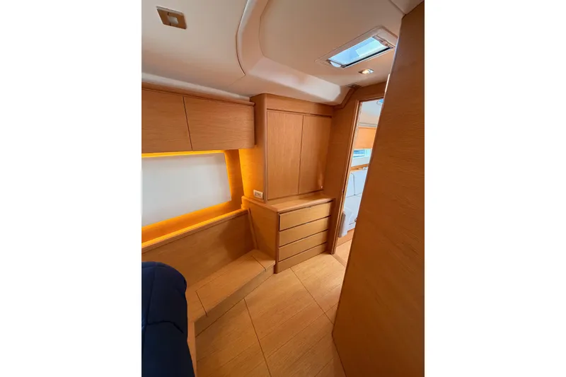 Slide: The Image of Luxurious wooden interior of a 2017 Solaris 50 yacht cabin with modern design. - 107