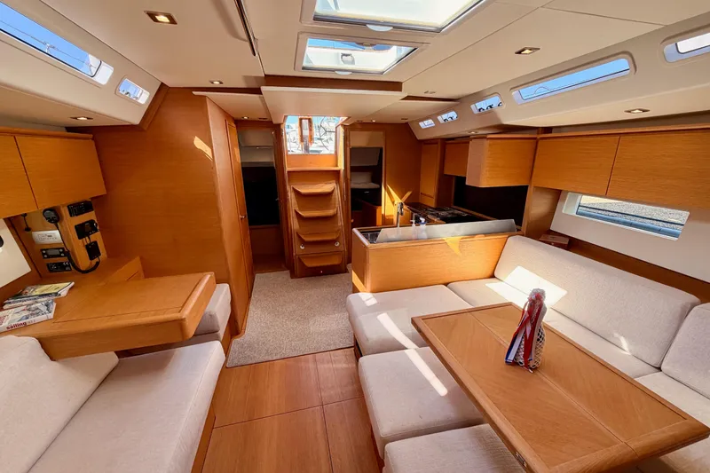 Slide: The Image of Luxurious interior of a 2017 Solaris 50 yacht with modern wood finish and ample seating. - 110