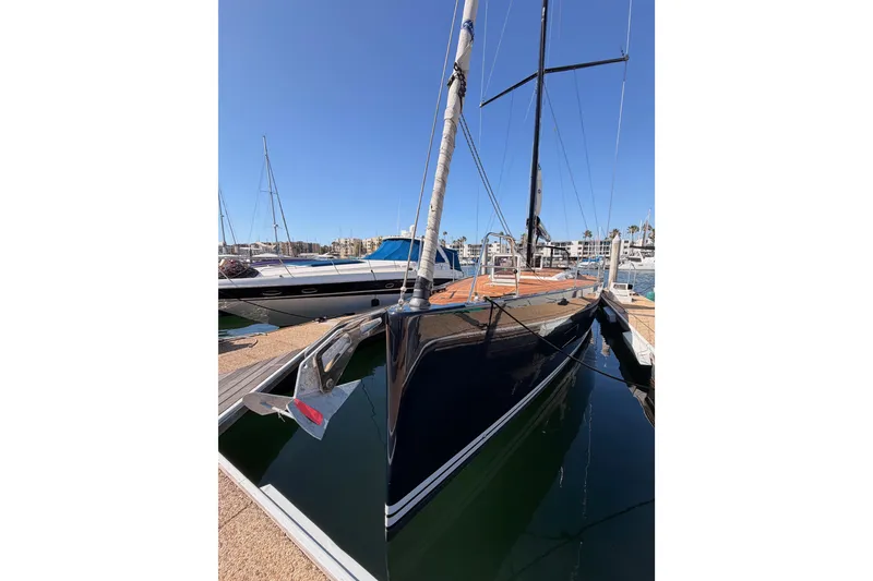 Slide: The Image of 2017 Solaris 50 yacht docked at marina under clear blue sky. - 12