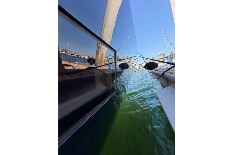 Slide: The Image of Side view of a 2017 Solaris 50 yacht docked in a marina. - 15