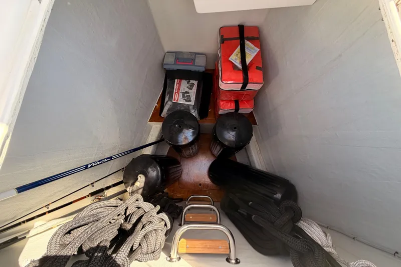 Slide: The Image of Storage compartment on a 2017 Solaris 50 yacht with ropes, fenders, and safety equipment. - 20