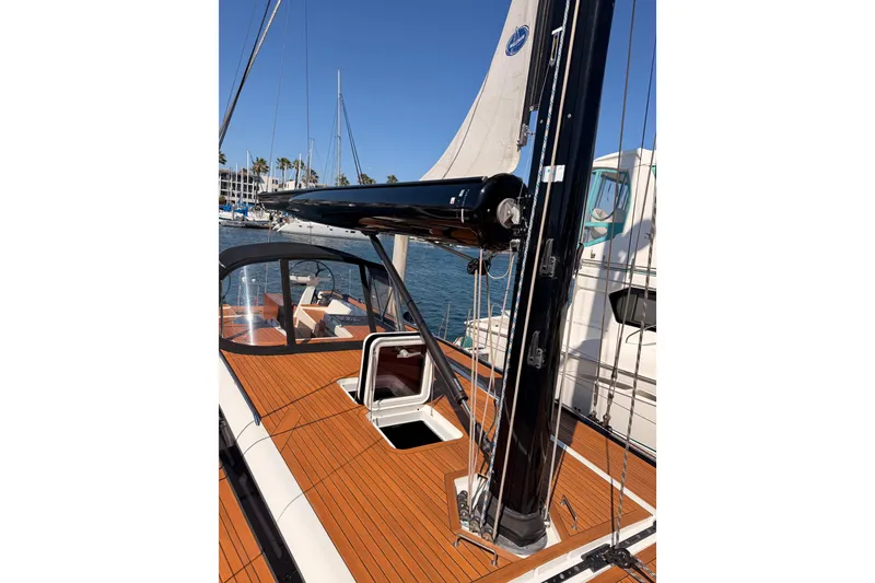 Slide: The Image of Sleek 2017 Solaris 50 yacht with polished deck and modern sail design in marina setting. - 27