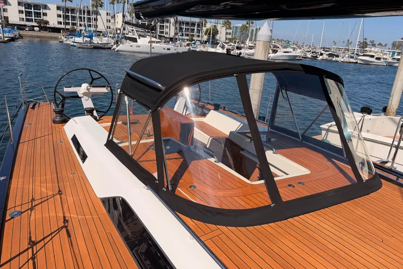 Slide: The Image of 2017 Solaris 50 yacht with sleek teak deck and modern cockpit design in marina setting. - 30