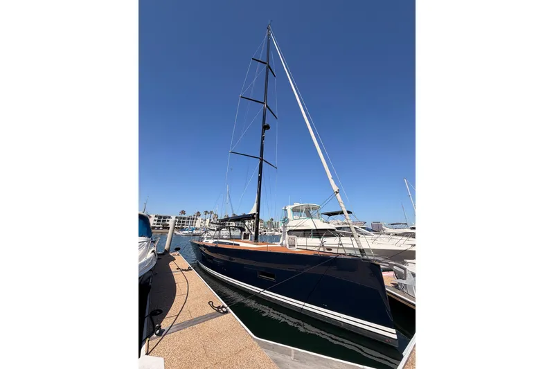 Slide: The Image of 2017 Solaris 50 yacht docked at marina under clear blue sky. - 4