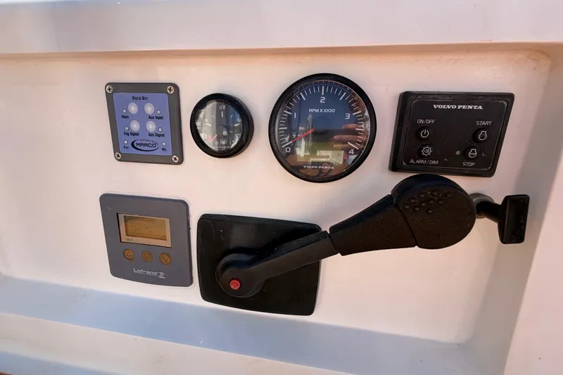 Slide: The Image of Control panel of a 2017 Solaris 50 yacht featuring gauges and switches. - 47