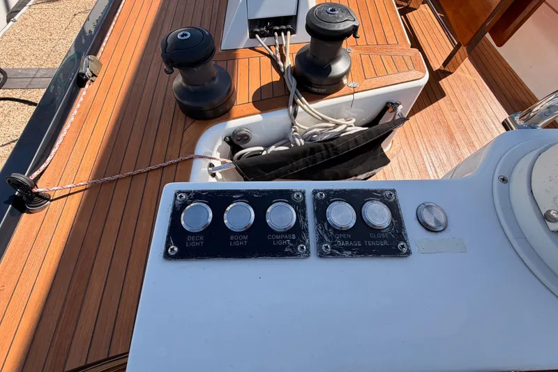 Slide: The Image of Control panel on 2017 Solaris 50 yacht deck with winches and teak flooring. - 52