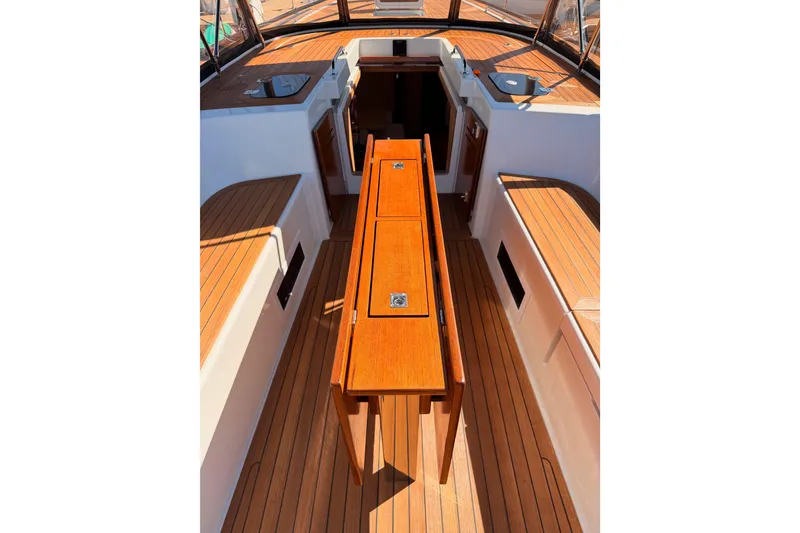 Slide: The Image of Luxurious 2017 Solaris 50 yacht interior with elegant wooden deck and seating area. - 55