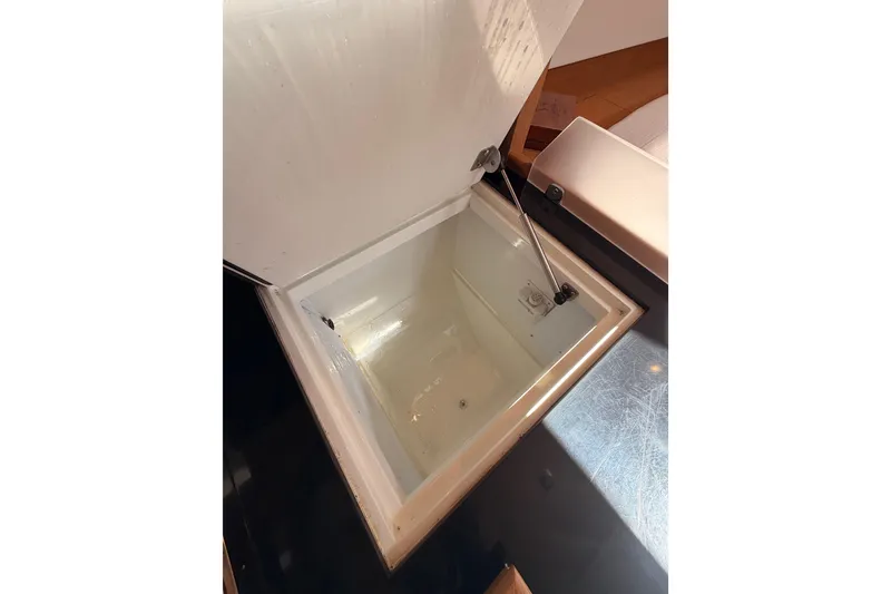 Slide: The Image of Open storage compartment on a 2017 Solaris 50 yacht, showcasing interior space. - 69