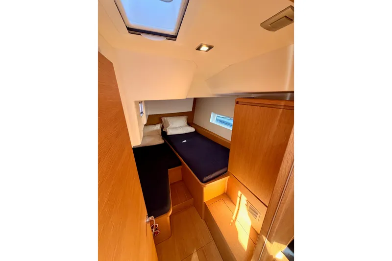 Slide: The Image of Cozy cabin interior of 2017 Solaris 50 yacht with wooden furnishings and skylight. - 73