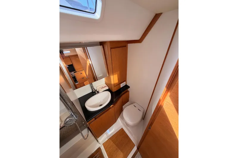 Slide: The Image of Interior of 2017 Solaris 50 yacht featuring wooden stairs and modern design elements. - 78